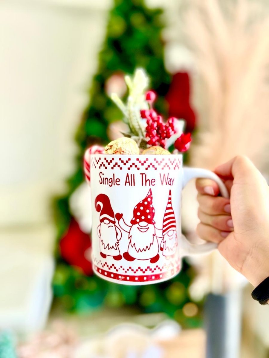 Detalle de la caja Christmas Emotions con lazo rojo