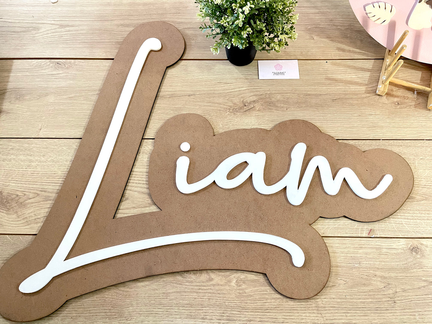 Brown and white Customized Wooden Name